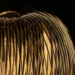 Ausgefallene Tischleuchte in Messingfarben - Ezenta