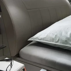 Bett mit Polsterkopfteil in Braun - Madita