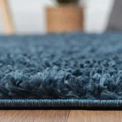 Dunkelblauer Teppich mit 150 cm Durchmesser - Asnes