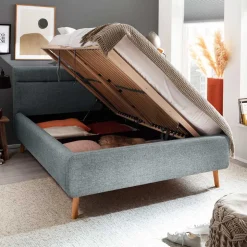 Hellblaues Polsterbett mit Bettkasten - Annelie