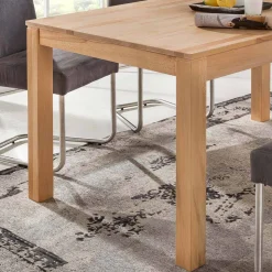 Massivholztisch mit 1 oder 2 Einlegeplatten Zanima aus lackierter Kernbuche