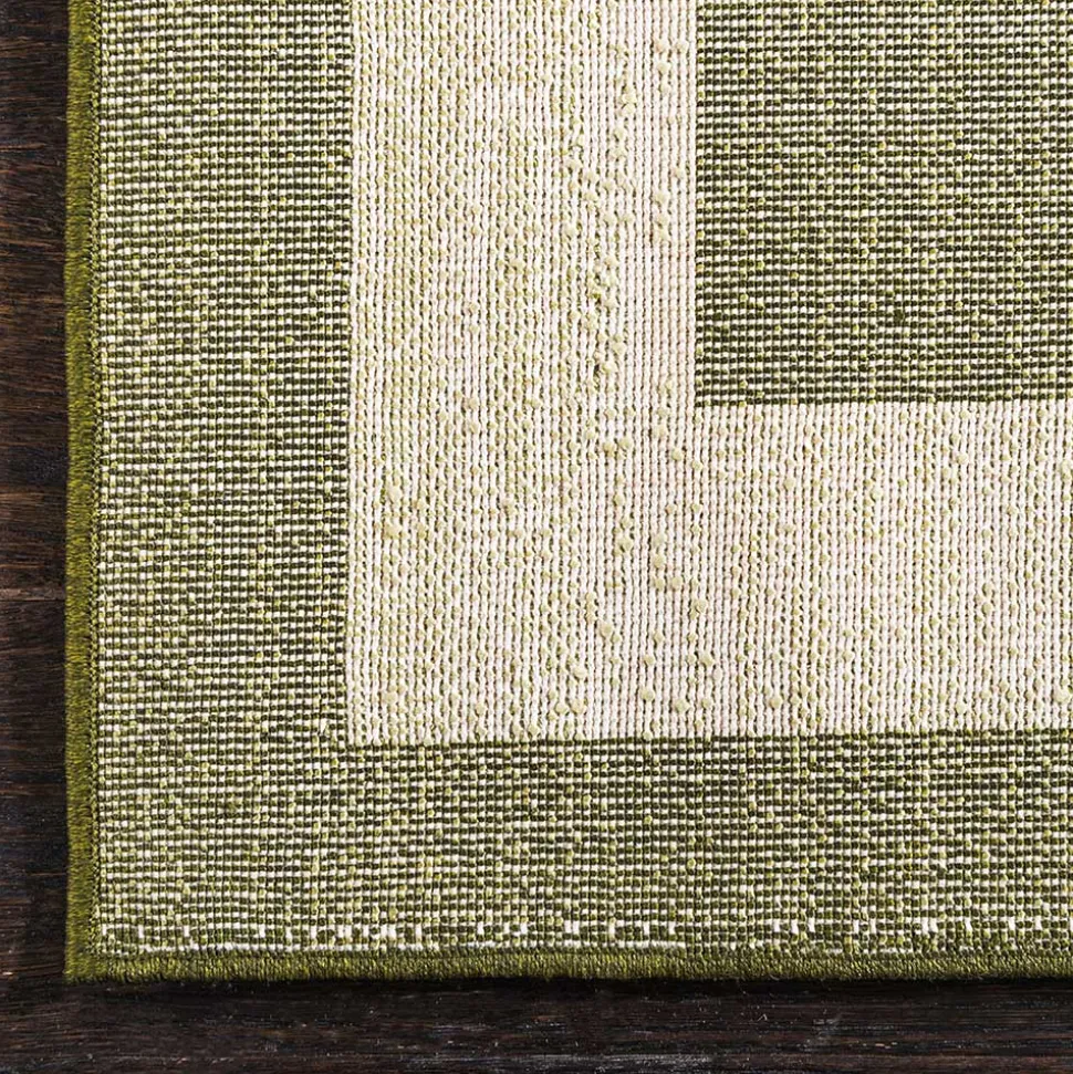 Teppich in Oliv Grün mit Rahmen in Creme - Loritana